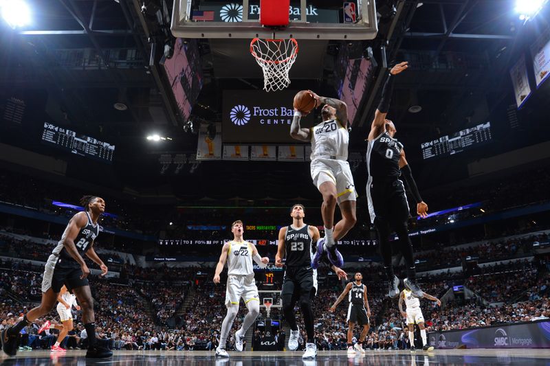 SAN ANTONIO, TX - NOVEMBER 9: John Collins #20 of the Utah Jazz dunks the ball during the game against the San Antonio Spurs on November 9, 2024 at the Frost Bank Center in San Antonio, Texas. NOTE TO USER: User expressly acknowledges and agrees that, by downloading and or using this photograph, user is consenting to the terms and conditions of the Getty Images License Agreement. Mandatory Copyright Notice: Copyright 2024 NBAE (Photos by Michael Gonzales/NBAE via Getty Images)