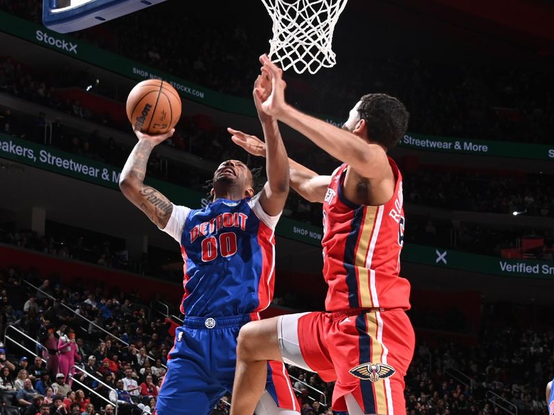 DETROIT, MI - MARCH 23: Ron Holland II #00 of the Detroit Pistons drives to the basket during the game against the New Orleans Pelicans on March 23, 2025 at Little Caesars Arena in Detroit, Michigan. NOTE TO USER: User expressly acknowledges and agrees that, by downloading and/or using this photograph, User is consenting to the terms and conditions of the Getty Images License Agreement. Mandatory Copyright Notice: Copyright 2025 NBAE (Photo by Chris Schwegler/NBAE via Getty Images)