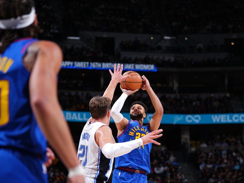 DENVER, CO - JANUARY 5: Jamal Murray #27 of the Denver Nuggets shoots the ball during the game against the Orlando Magic on January 5, 2024 at the Ball Arena in Denver, Colorado. NOTE TO USER: User expressly acknowledges and agrees that, by downloading and/or using this Photograph, user is consenting to the terms and conditions of the Getty Images License Agreement. Mandatory Copyright Notice: Copyright 2024 NBAE (Photo by Garrett Ellwood/NBAE via Getty Images)