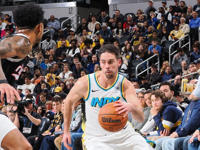 INDIANAPOLIS, IN - NOVEMBER 27: T.J. McConnell #9 of the Indiana Pacers dribbles the ball during the game against the Portland Trail Blazers on November 27, 2024 at Gainbridge Fieldhouse in Indianapolis, Indiana. NOTE TO USER: User expressly acknowledges and agrees that, by downloading and or using this Photograph, user is consenting to the terms and conditions of the Getty Images License Agreement. Mandatory Copyright Notice: Copyright 2024 NBAE (Photo by Ron Hoskins/NBAE via Getty Images)