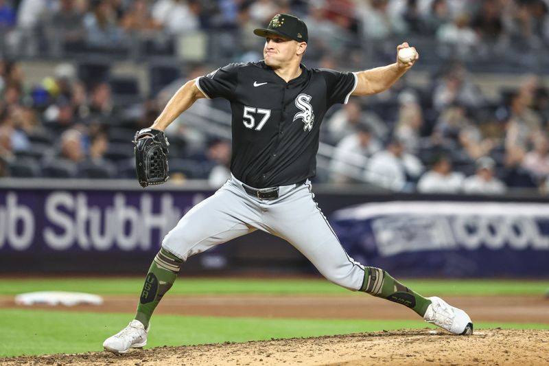 May 17, 2024; Bronx, New York, USA; Chicago White Sox relief pitcher Tanner Banks (57) pitches in the seventh inning against the New York Yankees at Yankee Stadium. Mandatory Credit: Wendell Cruz-USA TODAY Sports