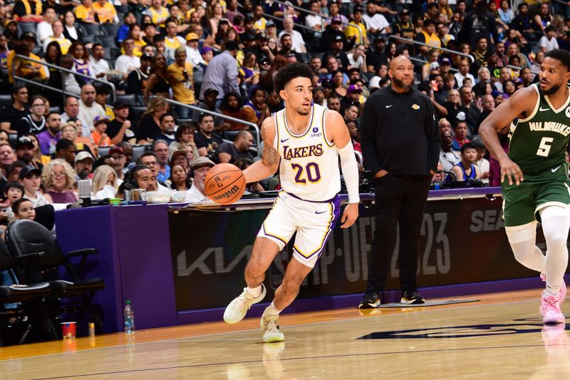 LOS ANGELES, CA - OCTOBER 15: Scotty Pippin Jr. #20 of the Los Angeles Lakers dribbles the ball during the game against the Milwaukee Bucks on October 15, 2023 at Crypto.Com Arena in Los Angeles, California. NOTE TO USER: User expressly acknowledges and agrees that, by downloading and/or using this Photograph, user is consenting to the terms and conditions of the Getty Images License Agreement. Mandatory Copyright Notice: Copyright 2023 NBAE (Photo by Adam Pantozzi/NBAE via Getty Images)