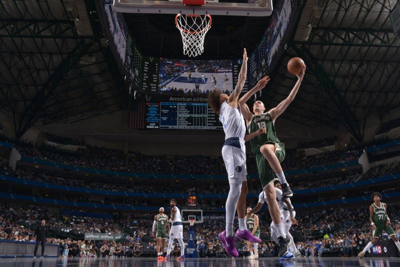 DALLAS, TX - OCTOBER 17: Anzejs Pasecniks #18 of the Milwaukee Bucks drives to the basket during the game against the Dallas Mavericks during a NBA preseason game on October 17, 2024 at American Airlines Center in Dallas, Texas. NOTE TO USER: User expressly acknowledges and agrees that, by downloading and or using this photograph, User is consenting to the terms and conditions of the Getty Images License Agreement. Mandatory Copyright Notice: Copyright 2024 NBAE (Photo by Glenn James/NBAE via Getty Images)