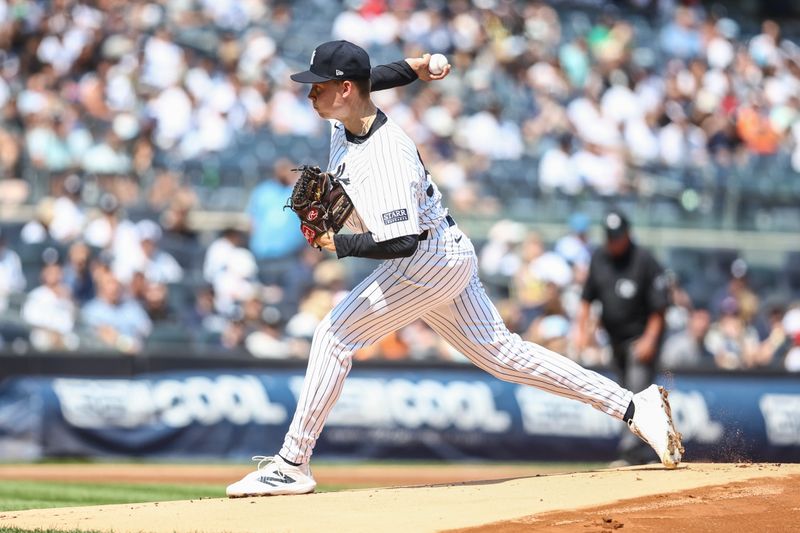 Aug 24, 2024; Bronx, New York, USA;  New York Yankees starting pitcher Will Warren (98) pitches in the first inning against the Colorado Rockies at Yankee Stadium. Mandatory Credit: Wendell Cruz-USA TODAY Sports