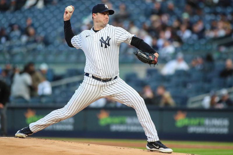 May 2, 2023; Bronx, New York, USA;  New York Yankees starting pitcher Gerrit Cole (45) pitches in the first inning against the against the Cleveland Guardians at Yankee Stadium. Mandatory Credit: Wendell Cruz-USA TODAY Sports