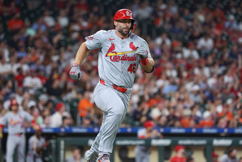 Jun 3, 2024; Houston, Texas, USA; St. Louis Cardinals first baseman Paul Goldschmidt (46) runs to first base on a double during the third inning against the Houston Astros at Minute Maid Park. Mandatory Credit: Troy Taormina-USA TODAY Sports