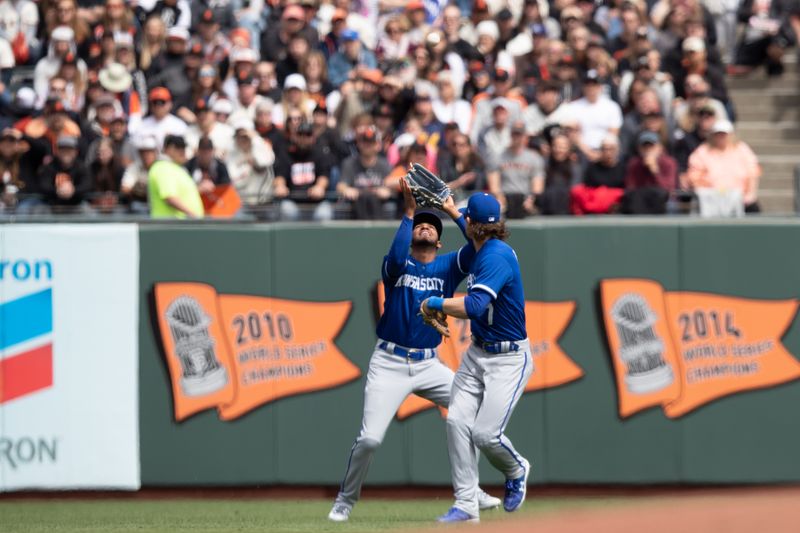 Apr 8, 2023; San Francisco, California, USA;  Kansas City Royals right fielder MJ Melendez (1) and center fielder Kyle Isbel (28) scramble for a fly ball against the San Francisco Giants during the second inning at Oracle Park. Mandatory Credit: John Hefti-USA TODAY Sports