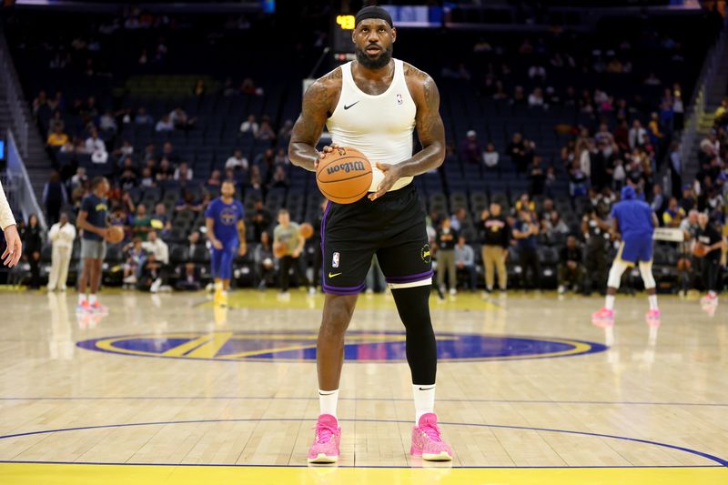 SAN FRANCISCO, CALIFORNIA - OCTOBER 18: LeBron James #23 of the Los Angeles Lakers warms up before their preseason game against the Golden State Warriors at Chase Center on October 18, 2024 in San Francisco, California.  NOTE TO USER: User expressly acknowledges and agrees that, by downloading and/or using this photograph, user is consenting to the terms and conditions of the Getty Images License Agreement.  (Photo by Ezra Shaw/Getty Images)