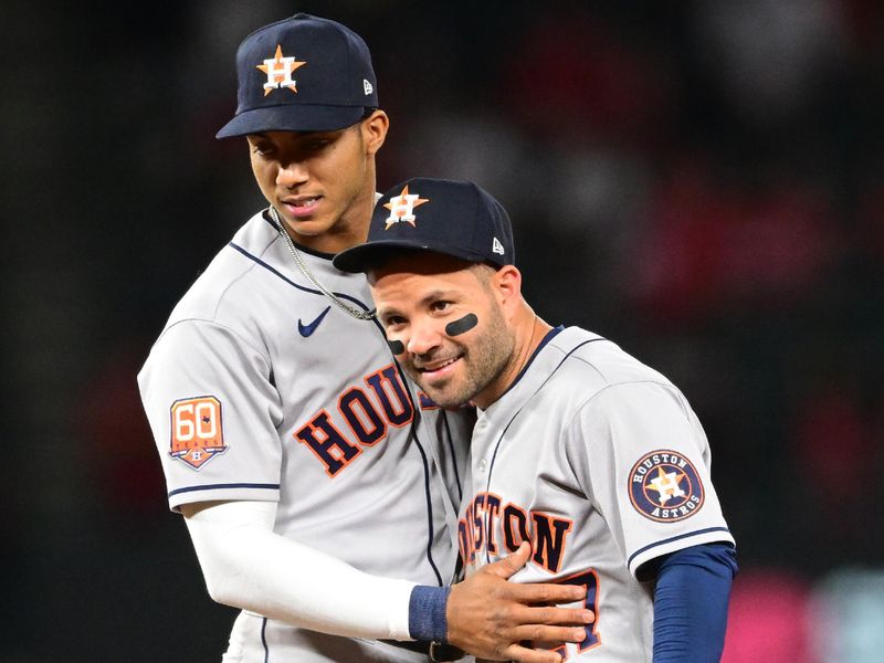 Apr 7, 2022; Anaheim, California, USA; Houston Astros shortstop Jeremy Pena (3) is congratulated by second baseman Jose Altuve (27) after the final out of the ninth inning defeating the Los Angeles Angels at Angel Stadium. Mandatory Credit: Jayne Kamin-Oncea-USA TODAY Sports