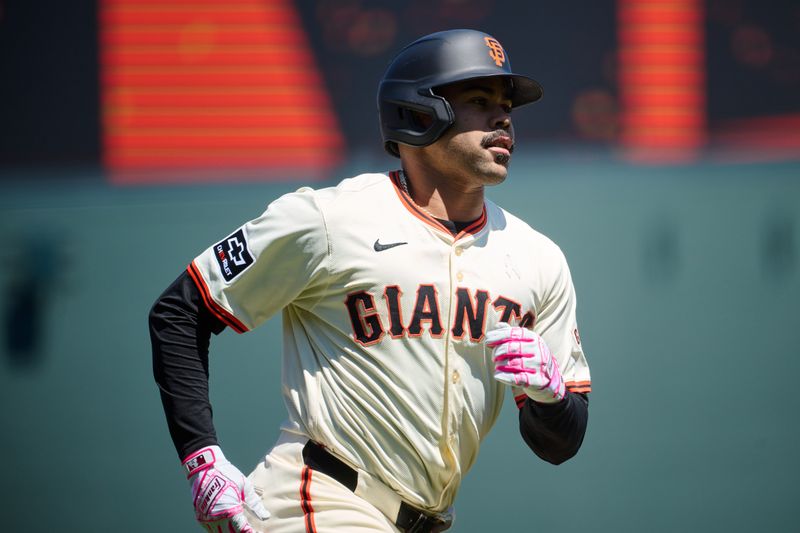 May 12, 2024; San Francisco, California, USA; San Francisco Giants infielder LaMonte Wade Jr. (31) runs the bases after hitting a two run home run against the Cincinnati Reds during the fifth inning at Oracle Park. Mandatory Credit: Robert Edwards-USA TODAY Sports