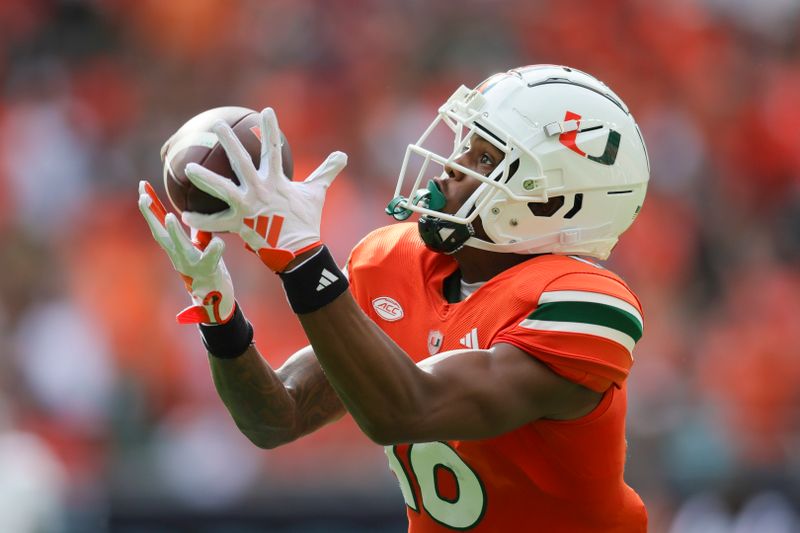 Sep 9, 2023; Miami Gardens, Florida, USA; Miami Hurricanes wide receiver Isaiah Horton (16) catches the football for a touchdown against the Texas A&M Aggies during the second quarter at Hard Rock Stadium. Mandatory Credit: Sam Navarro-USA TODAY Sports