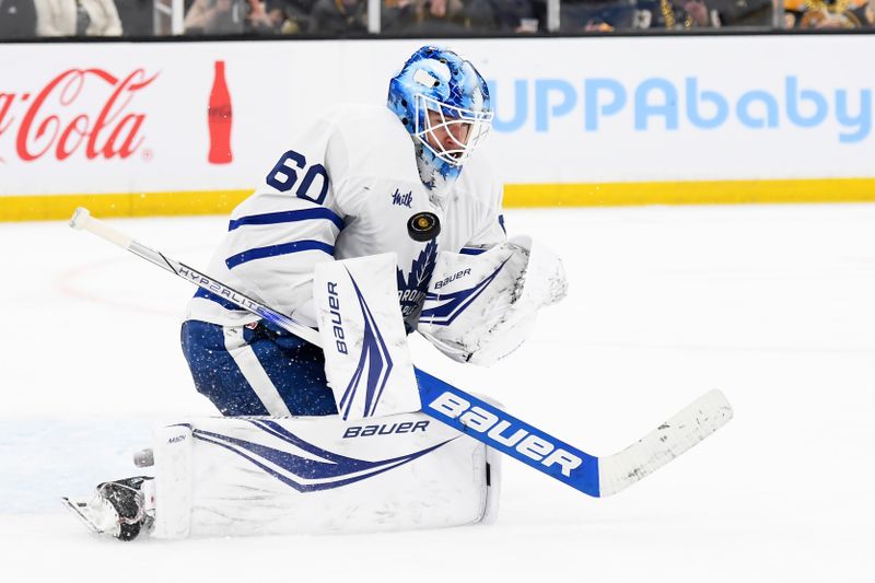 Apr 30, 2024; Boston, Massachusetts, USA; Toronto Maple Leafs goaltender Joseph Woll (60) makes a save during the third period in game five of the first round of the 2024 Stanley Cup Playoffs against the Boston Bruins at TD Garden. Mandatory Credit: Bob DeChiara-USA TODAY Sports