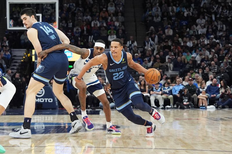 MINNEAPOLIS, MN -  JANUARY 11: Desmond Bane #22 of the Memphis Grizzlies drives to the basket during the game against the Minnesota Timberwolves on January 11, 2025 at Target Center in Minneapolis, Minnesota. NOTE TO USER: User expressly acknowledges and agrees that, by downloading and or using this Photograph, user is consenting to the terms and conditions of the Getty Images License Agreement. Mandatory Copyright Notice: Copyright 2025 NBAE (Photo by Jordan Johnson/NBAE via Getty Images)