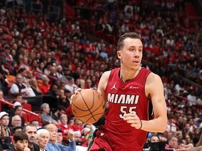 MIAMI, FL - DECEMBER 25:  Duncan Robinson #55 of the Miami Heat handles the ball during the game against the Philadelphia 76ers on December 25, 2023 at Kaseya Center in Miami, Florida. NOTE TO USER: User expressly acknowledges and agrees that, by downloading and or using this Photograph, user is consenting to the terms and conditions of the Getty Images License Agreement. Mandatory Copyright Notice: Copyright 2023 NBAE (Photo by David Sherman/NBAE via Getty Images)