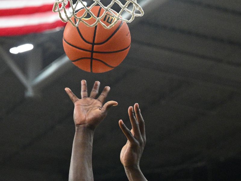 Jan 6, 2024; Iowa City, Iowa, USA; Rutgers Scarlet Knights forward Mawot Mag (3) shoots the ball against the Iowa Hawkeyes during the first half at Carver-Hawkeye Arena. Mandatory Credit: Jeffrey Becker-USA TODAY Sports