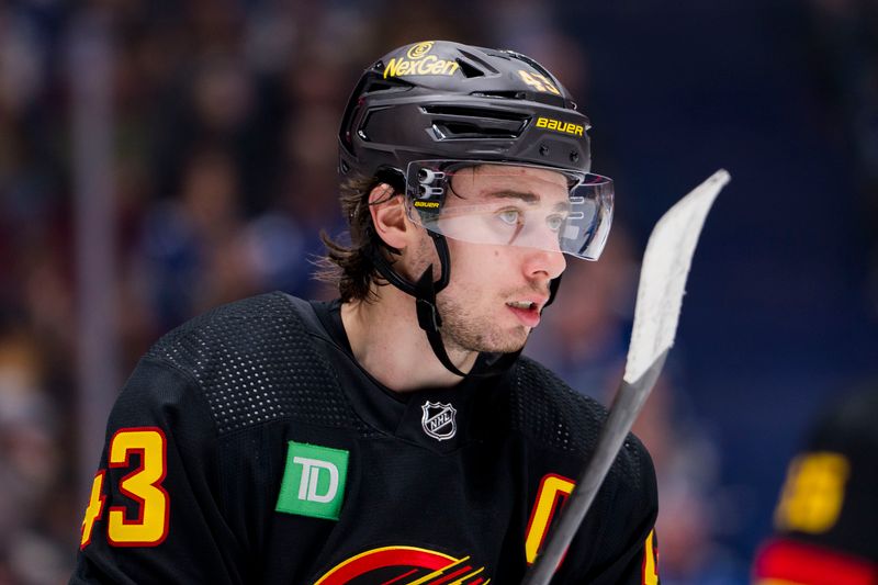 Jan 20, 2024; Vancouver, British Columbia, CAN; Vancouver Canucks defenseman Quinn Hughes (43) during a stop in play against the Toronto Maple Leafs in the second period at Rogers Arena. Mandatory Credit: Bob Frid-USA TODAY Sports