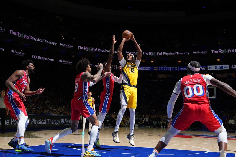 PHILADELPHIA, PA - DECEMBER 13: Myles Turner #33 of the Indiana Pacers shoots the ball during the game against the Philadelphia 76ers on December 13, 2024 at the Wells Fargo Center in Philadelphia, Pennsylvania NOTE TO USER: User expressly acknowledges and agrees that, by downloading and/or using this Photograph, user is consenting to the terms and conditions of the Getty Images License Agreement. Mandatory Copyright Notice: Copyright 2024 NBAE (Photo by Jesse D. Garrabrant/NBAE via Getty Images)