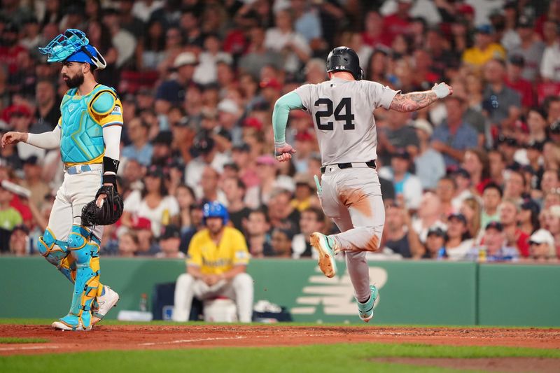 Jul 27, 2024; Boston, Massachusetts, USA; New York Yankees right fielder Alex Verdugo (24) scores a run on New York Yankees designated hitter Aaron Judge (not pictured) RBI single against the Boston Red Sox during the fifth inning at Fenway Park. Mandatory Credit: Gregory Fisher-USA TODAY Sports