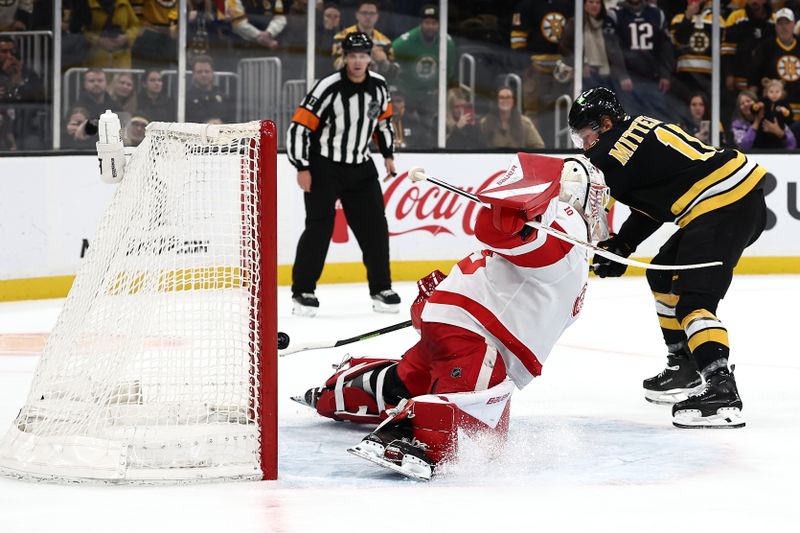 Nov 29, 2025; Boston, Massachusetts, USA; Boston Bruins center Casey Mittelstadt (11) scores the only goal during a shootout against Detroit Red Wings goaltender Cam Talbot (39) in Boston’s 3-2 win at TD Garden. Mandatory Credit: Winslow Townson-Imagn Images