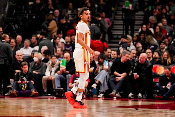 TORONTO, ON - DECEMBER 13: Trae Young #11 of the Atlanta Hawks looks on against the Toronto Raptors during first half NBA action at Scotiabank Arena on December 13, 2023 in Toronto, Ontario, Canada. NOTE TO USER: User expressly acknowledges and agrees that, by downloading and/or using this Photograph, user is consenting to the terms and conditions of the Getty Images License Agreement. (Photo by Andrew Lahodynskyj/Getty Images)