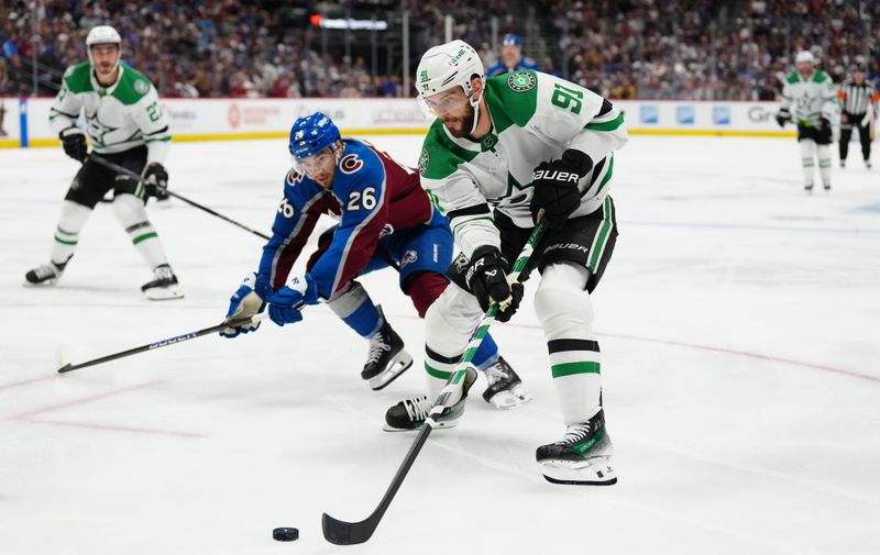 May 17, 2024; Denver, Colorado, USA; Dallas Stars center Tyler Seguin (91) controls the puck in the first period against the Colorado Avalanche in game six of the second round of the 2024 Stanley Cup Playoffs at Ball Arena. Mandatory Credit: Ron Chenoy-USA TODAY Sports