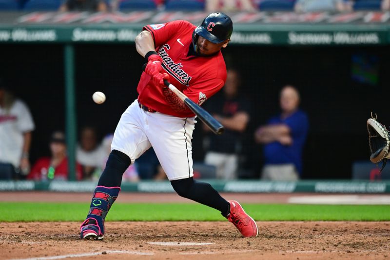 Jun 19, 2024; Cleveland, Ohio, USA; Cleveland Guardians first baseman Josh Naylor (22) hits a home run during the seventh inning against the Seattle Mariners at Progressive Field. Mandatory Credit: Ken Blaze-USA TODAY Sports