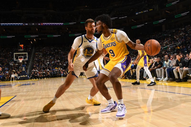 SAN FRANCISCO, CA - OCTOBER 18: Bronny James #9 of the Los Angeles Lakers handles the ball during the game against the Golden State Warriors during a NBA Preseason game on October 18, 2024 at Chase Center in San Francisco, California. NOTE TO USER: User expressly acknowledges and agrees that, by downloading and or using this photograph, user is consenting to the terms and conditions of Getty Images License Agreement. Mandatory Copyright Notice: Copyright 2024 NBAE (Photo by Noah Graham/NBAE via Getty Images)