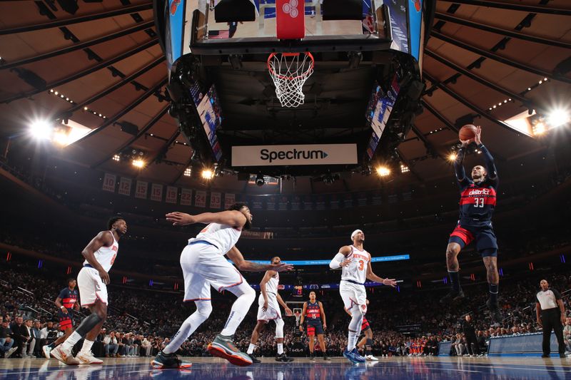 NEW YORK, NY - NOVEMBER 18: Kyle Kuzma #33 of the Washington Wizards drives to the basket during the game against the New York Knicks on November 18, 2024 at Madison Square Garden in New York City, New York.  NOTE TO USER: User expressly acknowledges and agrees that, by downloading and or using this photograph, User is consenting to the terms and conditions of the Getty Images License Agreement. Mandatory Copyright Notice: Copyright 2024 NBAE  (Photo by Nathaniel S. Butler/NBAE via Getty Images)