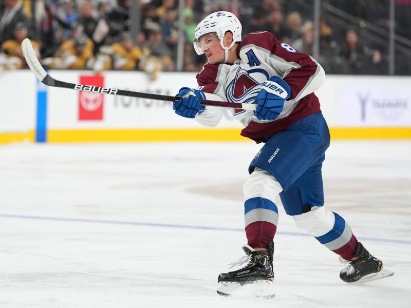 Oct 22, 2022; Las Vegas, Nevada, USA; Colorado Avalanche defenseman Cale Makar (8) shoots against the Vegas Golden Knights during the second period at T-Mobile Arena. Mandatory Credit: Stephen R. Sylvanie-USA TODAY Sports