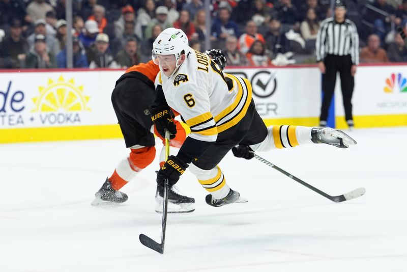 Feb 28, 2026; Philadelphia, Pennsylvania, USA; Boston Bruins defenseman Mason Lohrei (6) falls after shooting the puck against the Philadelphia Flyers in the first period at Xfinity Mobile Arena. Mandatory Credit: Kyle Ross-Imagn Images