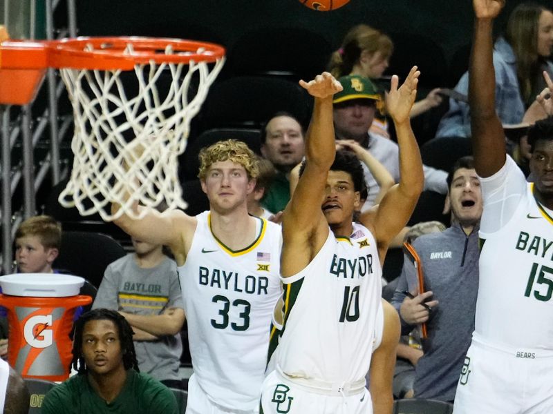 Nov 28, 2023; Waco, Texas, USA;  Baylor Bears guard RayJ Dennis (10) scores a three-point basket against the Nicholls State Colonels during the second half at Ferrell Center. Mandatory Credit: Chris Jones-USA TODAY Sports