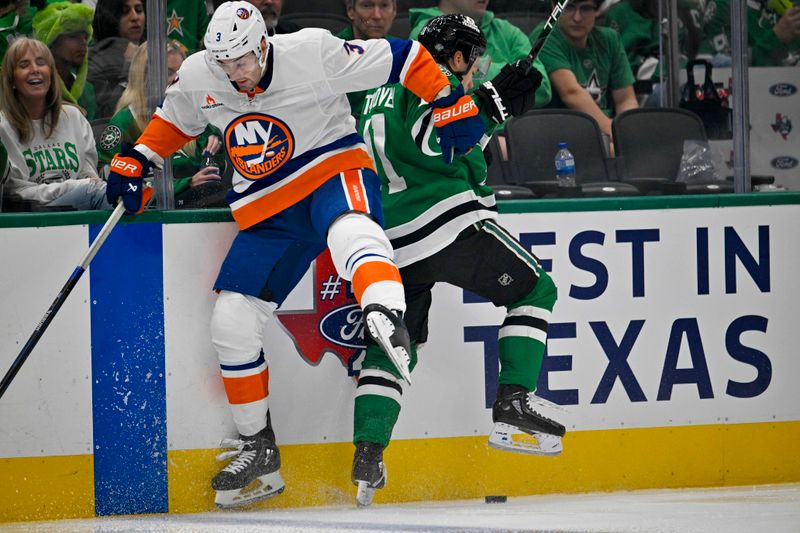 Oct 12, 2024; Dallas, Texas, USA; New York Islanders defenseman Adam Pelech (3) checks Dallas Stars center Logan Stankoven (11) during the second period at the American Airlines Center. Mandatory Credit: Jerome Miron-Imagn Images