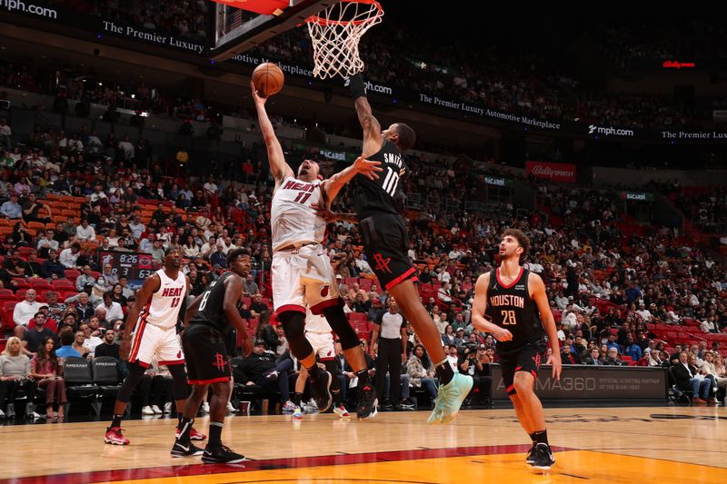MIAMI, FL - JANUARY 8: Jaime Jaquez Jr. #11 of the Miami Heat drives to the basket during the game against the Houston Rockets on January 8, 2024 at Kaseya Center in Miami, Florida. NOTE TO USER: User expressly acknowledges and agrees that, by downloading and or using this Photograph, user is consenting to the terms and conditions of the Getty Images License Agreement. Mandatory Copyright Notice: Copyright 2024 NBAE (Photo by Issac Baldizon/NBAE via Getty Images)