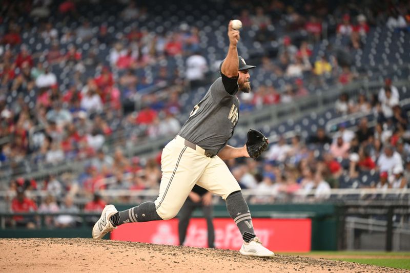 Aug 31, 2024; Washington, District of Columbia, USA; Washington Nationals relief pitcher Tanner Rainey (21) throws against the Chicago Cubs during the ninth inning at Nationals Park. Mandatory Credit: Rafael Suanes-USA TODAY Sports