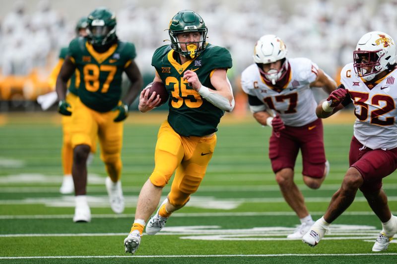 Oct 28, 2023; Waco, Texas, USA;  Baylor Bears running back Dawson Pendergrass (35) runs the ball as Iowa State Cyclones linebacker Gerry Vaughn (32) pursues during the second half at McLane Stadium. Mandatory Credit: Chris Jones-USA TODAY Sports