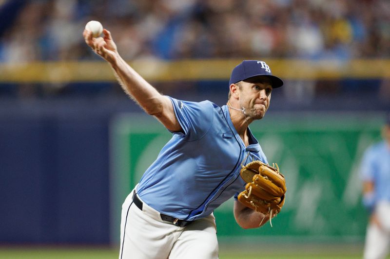 Jun 30, 2024; St. Petersburg, Florida, USA;  Tampa Bay Rays pitcher Jason Adam (47) throws a pitch against the Washington Nationals in the seventh inning at Tropicana Field. Mandatory Credit: Nathan Ray Seebeck-USA TODAY Sports