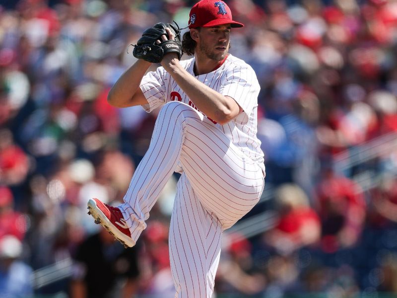 Feb 25, 2024; Clearwater, Florida, USA;  Philadelphia Phillies starting pitcher Aaron Nola (27) throws a pitch against the New York Yankees in the first inning at BayCare Ballpark. Mandatory Credit: Nathan Ray Seebeck-USA TODAY Sports