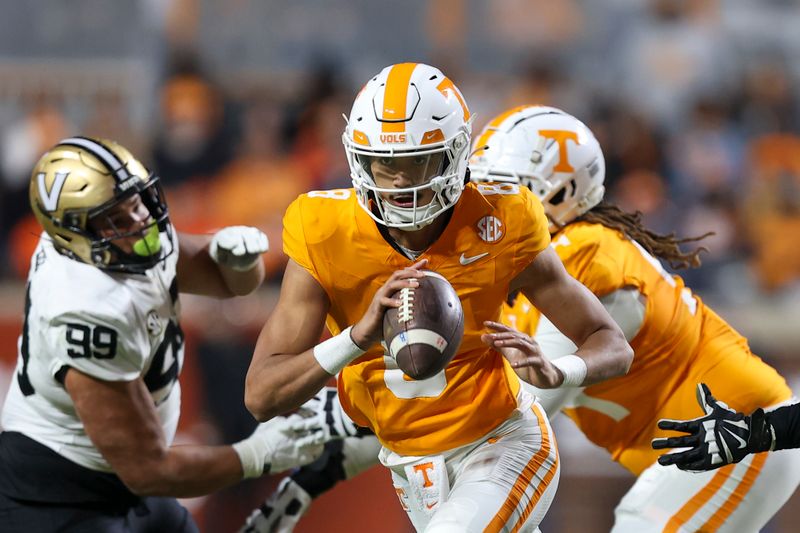 Nov 25, 2023; Knoxville, Tennessee, USA; Tennessee Volunteers quarterback Nico Iamaleava (8) scrambles with the ball against the Vanderbilt Commodores during the second half at Neyland Stadium. Mandatory Credit: Randy Sartin-USA TODAY Sports