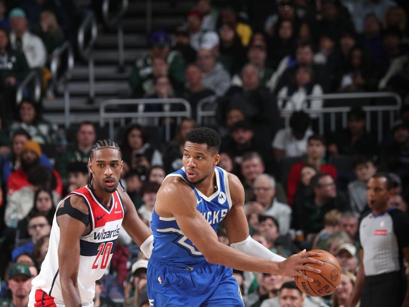 MILWAUKEE, WI - NOVEMBER 30: Giannis Antetokounmpo #34 of the Milwaukee Bucks handles the ball during the game against the Washington Wizards on November 30, 2024 at Fiserv Forum Center in Milwaukee, Wisconsin. NOTE TO USER: User expressly acknowledges and agrees that, by downloading and or using this Photograph, user is consenting to the terms and conditions of the Getty Images License Agreement. Mandatory Copyright Notice: Copyright 2024 NBAE (Photo by Gary Dineen/NBAE via Getty Images).