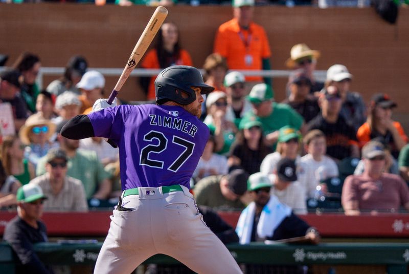 Mar 17, 2024; Scottsdale, Arizona, USA; Colorado Rockies outfielder Bradley Zimmer (27) at bat in the seventh inning during a spring training game against the San Francisco Giants at Scottsdale Stadium. Mandatory Credit: Allan Henry-USA TODAY Sports