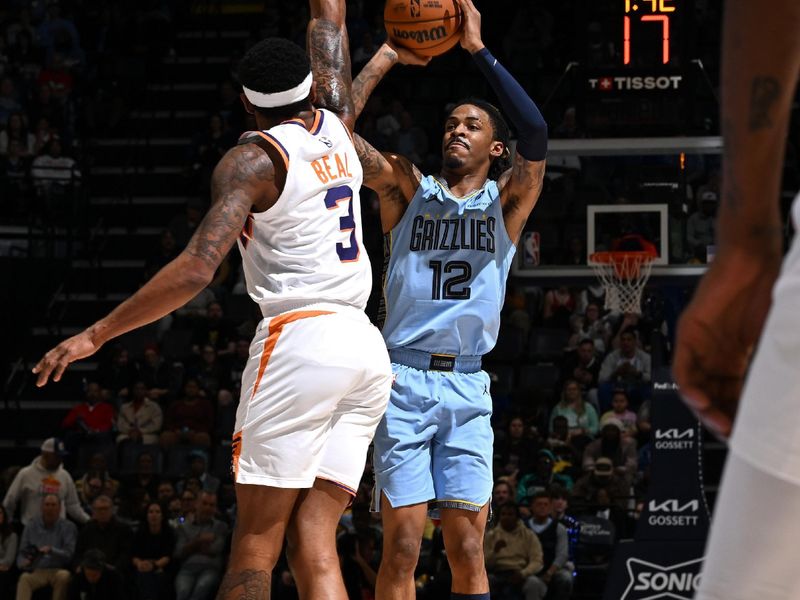 MEMPHIS, TN - FEBRUARY 25: Ja Morant #12 of the Memphis Grizzlies three point basket during the game against the Phoenix Suns on February 25, 2025 at FedExForum in Memphis, Tennessee. NOTE TO USER: User expressly acknowledges and agrees that, by downloading and or using this photograph, User is consenting to the terms and conditions of the Getty Images License Agreement. Mandatory Copyright Notice: Copyright 2025 NBAE(Photo by Grant Burke/NBAE via Getty Images)