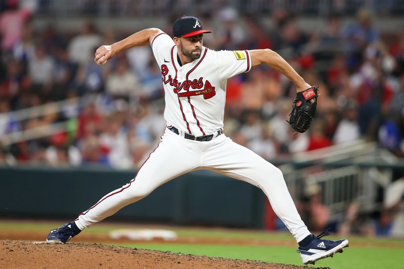 Jun 27, 2023; Atlanta, Georgia, USA; Atlanta Braves relief pitcher Ben Heller (71) throws against the Minnesota Twins in the ninth inning at Truist Park. Mandatory Credit: Brett Davis-USA TODAY Sports