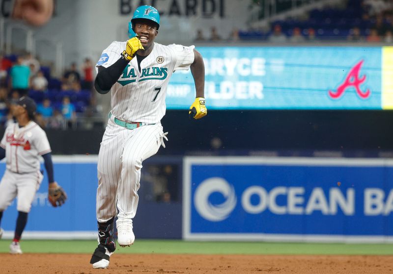 Sep 15, 2023; Miami, Florida, USA; Miami Marlins right fielder Jesus Sanchez (7) heads to third base as he triples against the Atlanta Braves during the first inning at loanDepot Park. Mandatory Credit: Rhona Wise-USA TODAY Sports