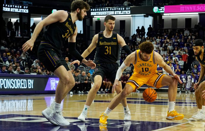 Jan 28, 2023; Evanston, Illinois, USA; Northwestern Wildcats forward Robbie Beran (31) defends Minnesota Golden Gophers forward Jamison Battle (10) during the first half at Welsh-Ryan Arena. Mandatory Credit: David Banks-USA TODAY Sports