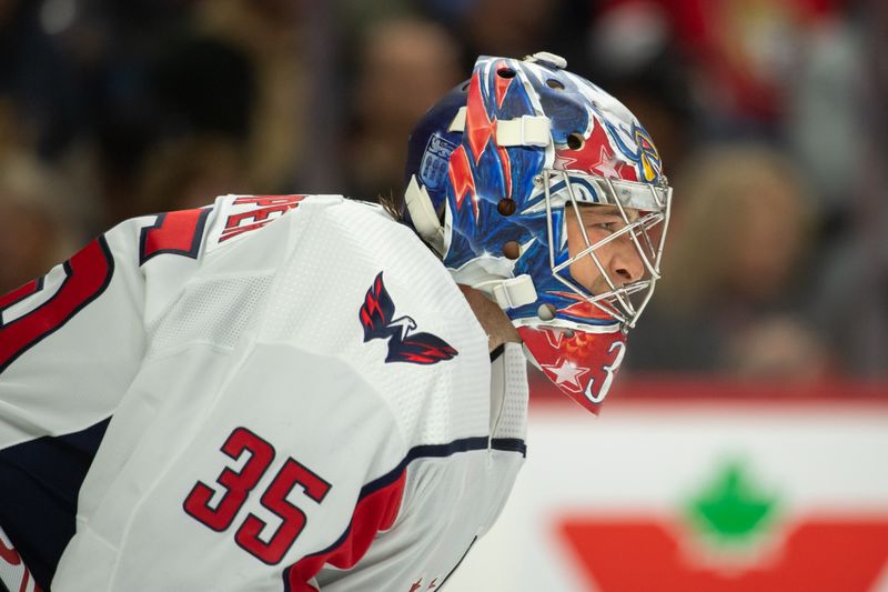 Oct 18, 2023; Ottawa, Ontario, CAN; Washington Capitals goalie Darcy Kuemper (35) looks up the ice prior to the start of the first period against the Ottawa Senators at the Canadian Tire Centre. Mandatory Credit: Marc DesRosiers-USA TODAY Sports