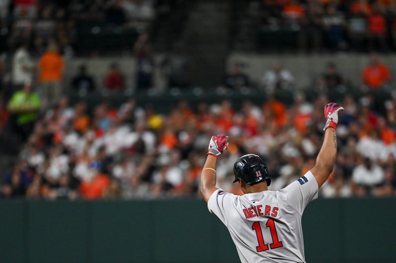 Aug 16, 2024; Baltimore, Maryland, USA; Boston Red Sox third baseman Rafael Devers (11) reacts after hitting a  third inning two run home run against the Baltimore Orioles  at Oriole Park at Camden Yards. Mandatory Credit: Tommy Gilligan-USA TODAY Sports