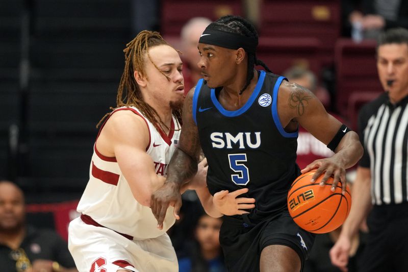 Feb 28, 2026; Stanford, California, USA; Southern Methodist University Mustangs guard Jaron Pierre Jr. (5) dribbles against Stanford Cardinal guard Jeremy Dent-Smith (left) during the first half at Maples Pavilion. Mandatory Credit: Darren Yamashita-Imagn Images