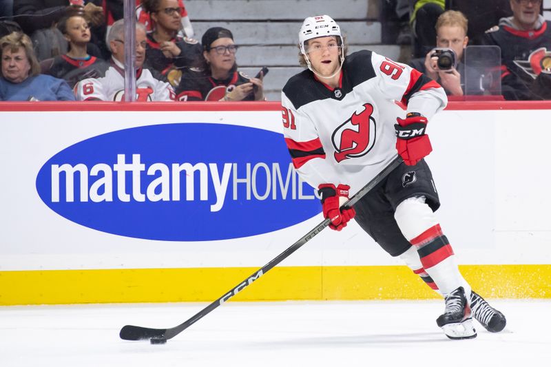 Apr 6, 2024; Ottawa, Ontario, CAN; New Jersey Devils center Dawson Mercer (91) skates with the puck in the first period against the Ottawa Senators at the Canadian Tire Centre. Mandatory Credit: Marc DesRosiers-USA TODAY Sports