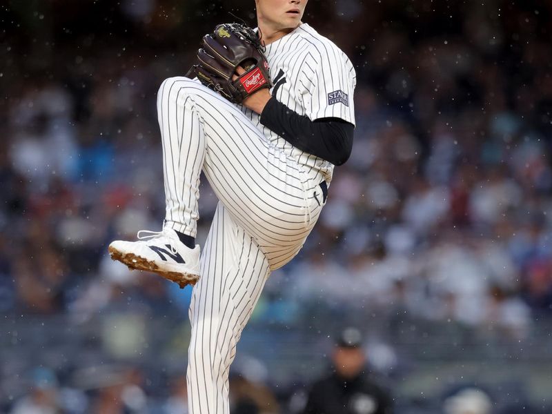Aug 7, 2024; Bronx, New York, USA; New York Yankees starting pitcher Will Warren (98) pitches against the Los Angeles Angels during the first inning at Yankee Stadium. Mandatory Credit: Brad Penner-USA TODAY Sports
