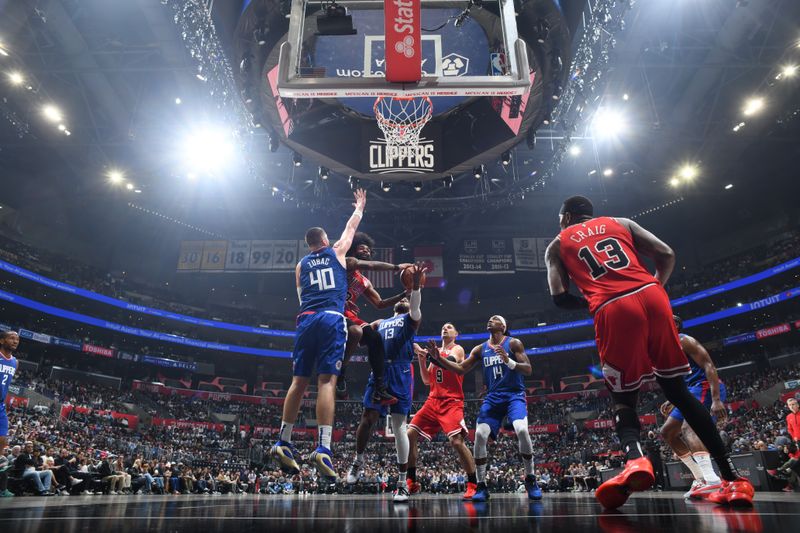 LOS ANGELES, CA - MARCH 9: Russell Westbrook #0 of the LA Clippers shoots the ball during the game against the LA Clippers on March 9, 2024 at Crypto.Com Arena in Los Angeles, California. NOTE TO USER: User expressly acknowledges and agrees that, by downloading and/or using this Photograph, user is consenting to the terms and conditions of the Getty Images License Agreement. Mandatory Copyright Notice: Copyright 2024 NBAE (Photo by Adam Pantozzi/NBAE via Getty Images)